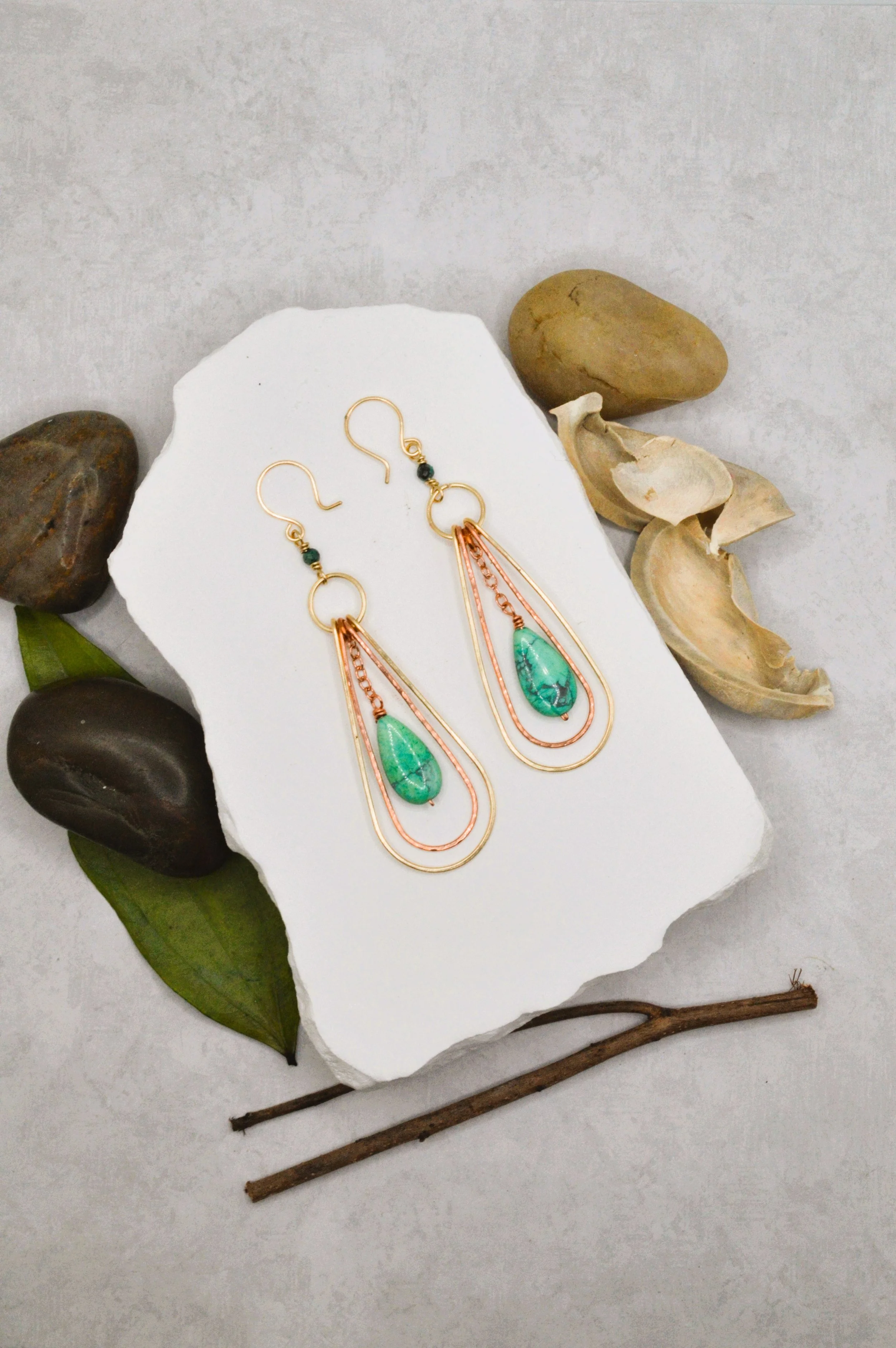handmade copper and brass teardrop dangle earrings with turquoise bead and chrysocolla accent