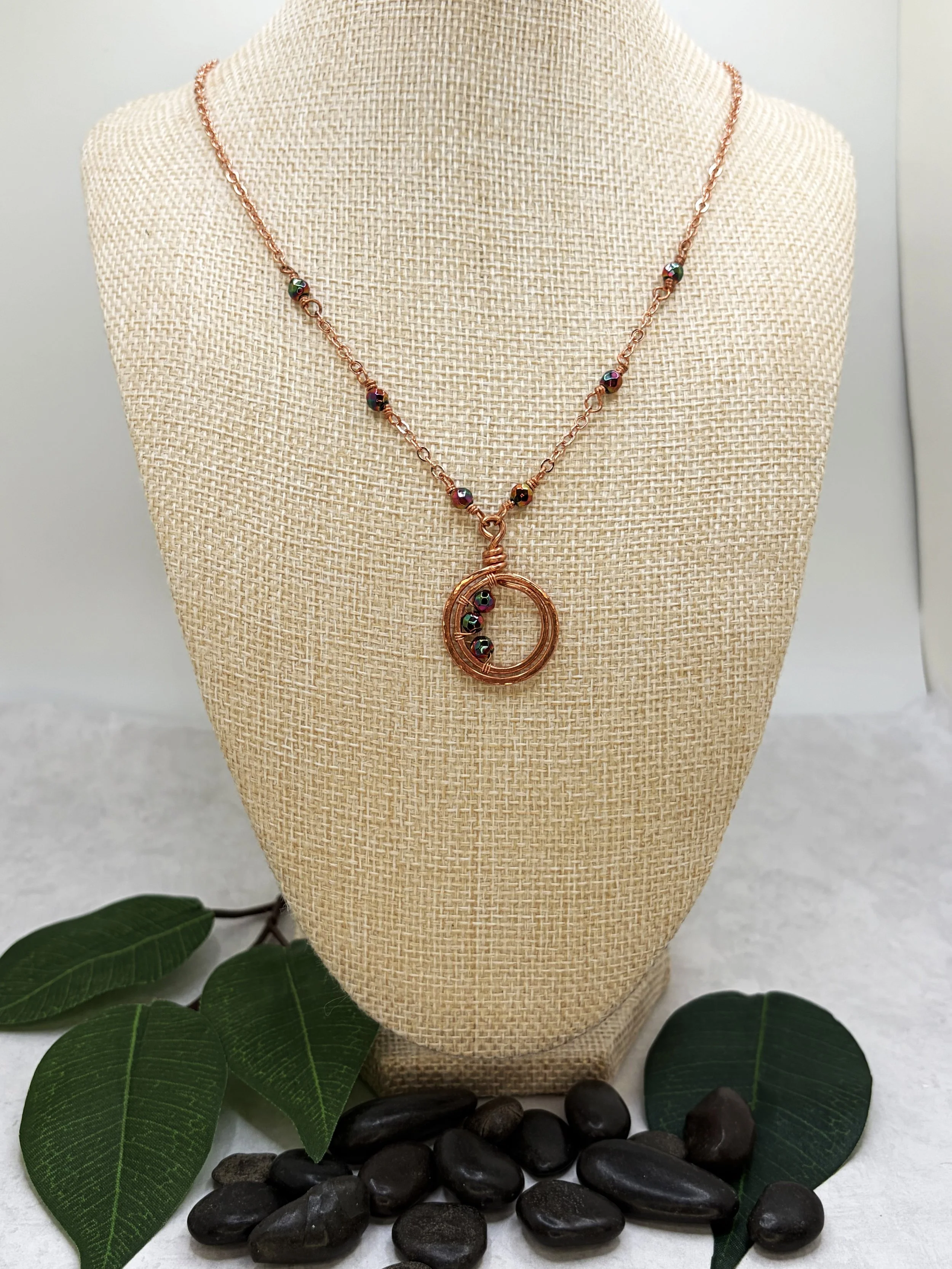 handmade copper chain necklace with hematite beads and hammered double loop pendant