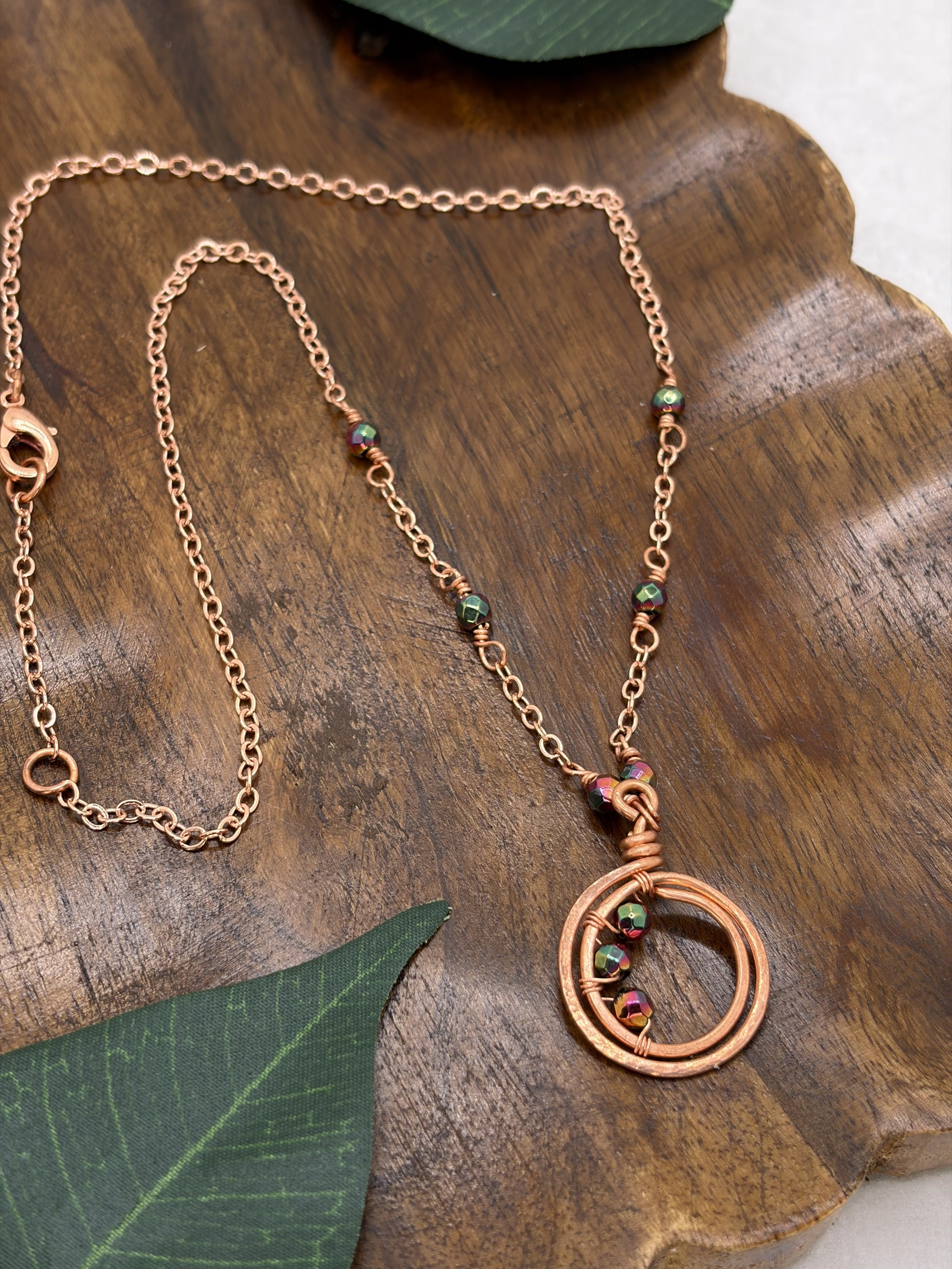 Rainbow Ripple — Hammered Copper Loop Necklace with Hematite