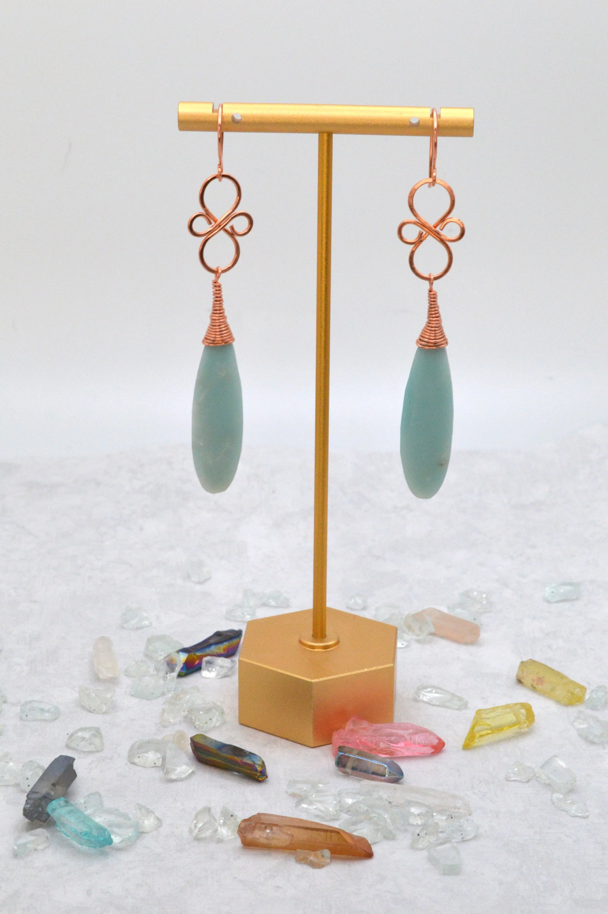 handmade calcite copper wire wrapped teardrop earrings with ornate copper knotwork link