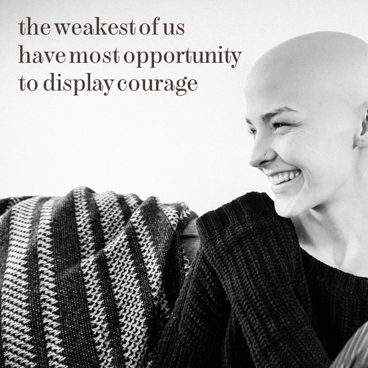 A smiling bald person looking to the right, with a quote about courage on the left side of the image. The quote reads, 'the weakest of us have most opportunity to display courage,' and the person is wearing a black top.
