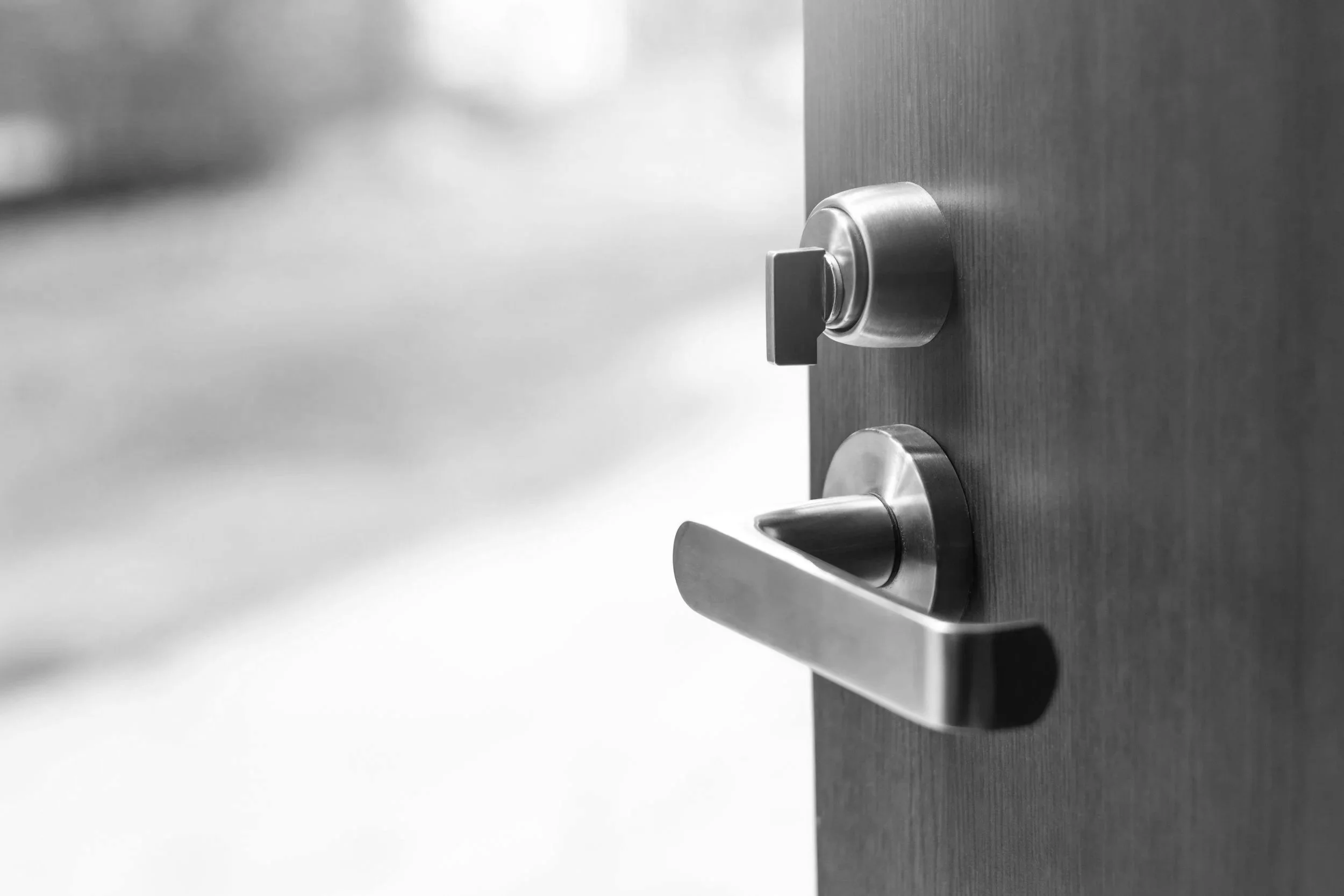 Office door handle representing the Five Doors of dental practice ownership
