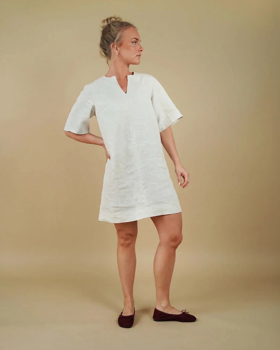 city-dress-front-view-hand-on-hip.webp