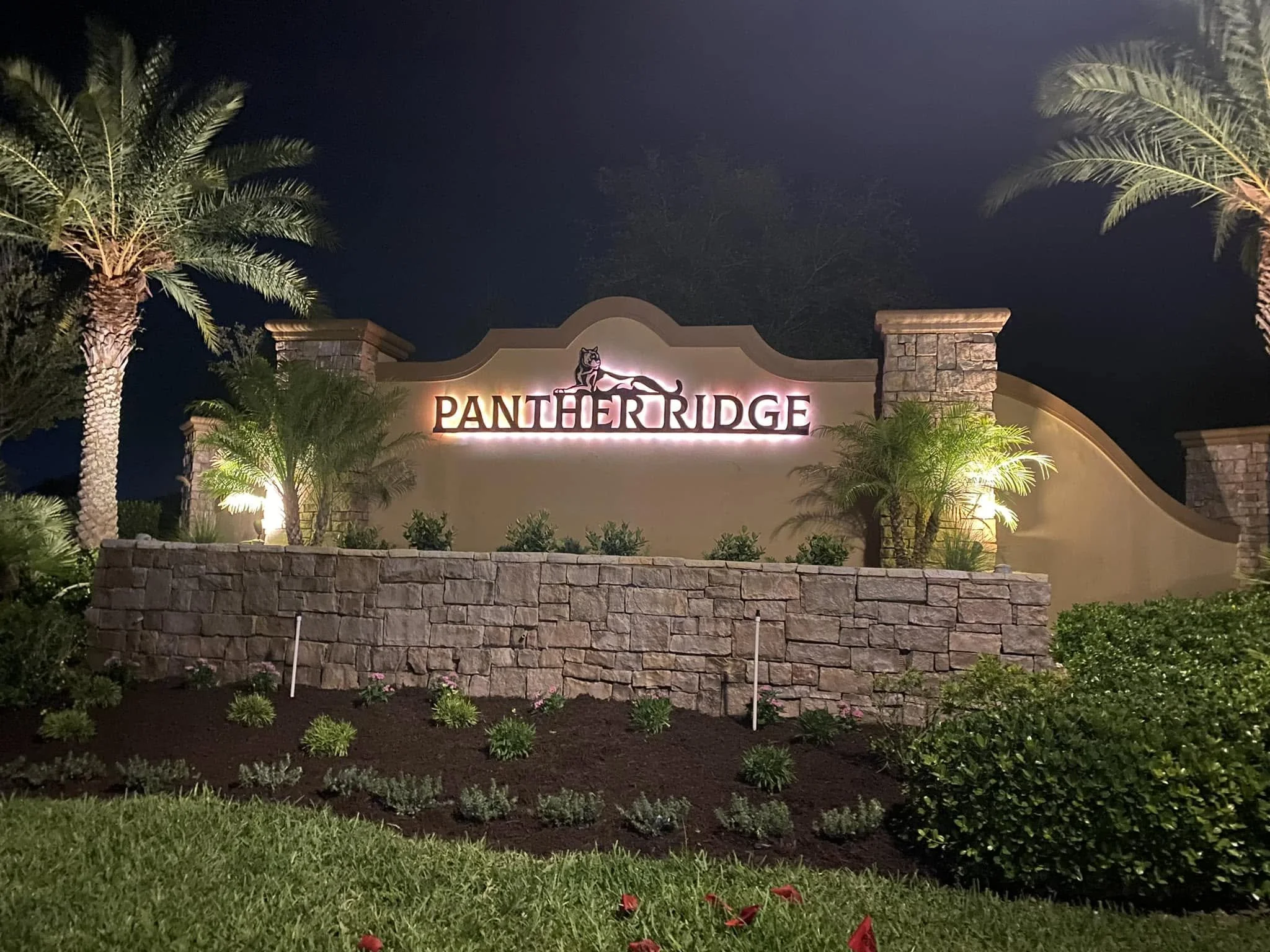 Business sign made from aluminum and added lighting