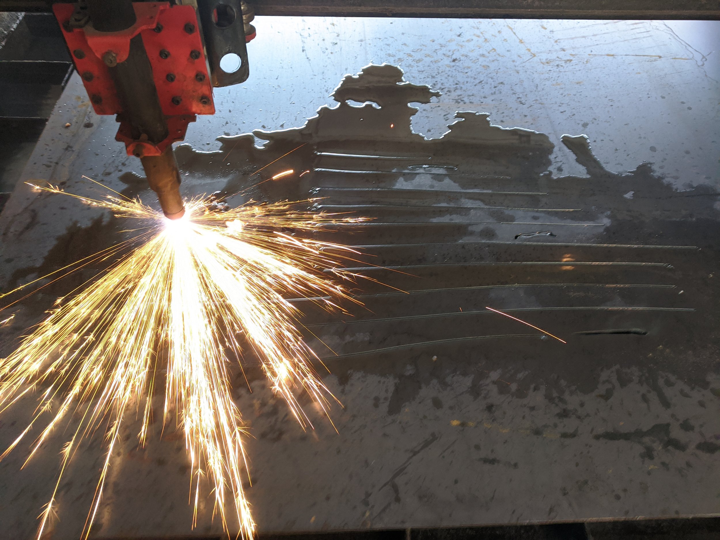 High-precision plasma cutting for intricate metal designs, custom parts, and artistic signage