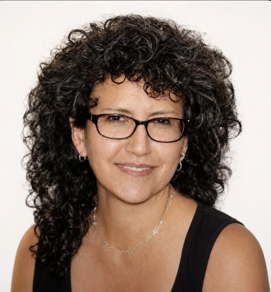 Acupuncture and wellness practitioner in a professional portrait