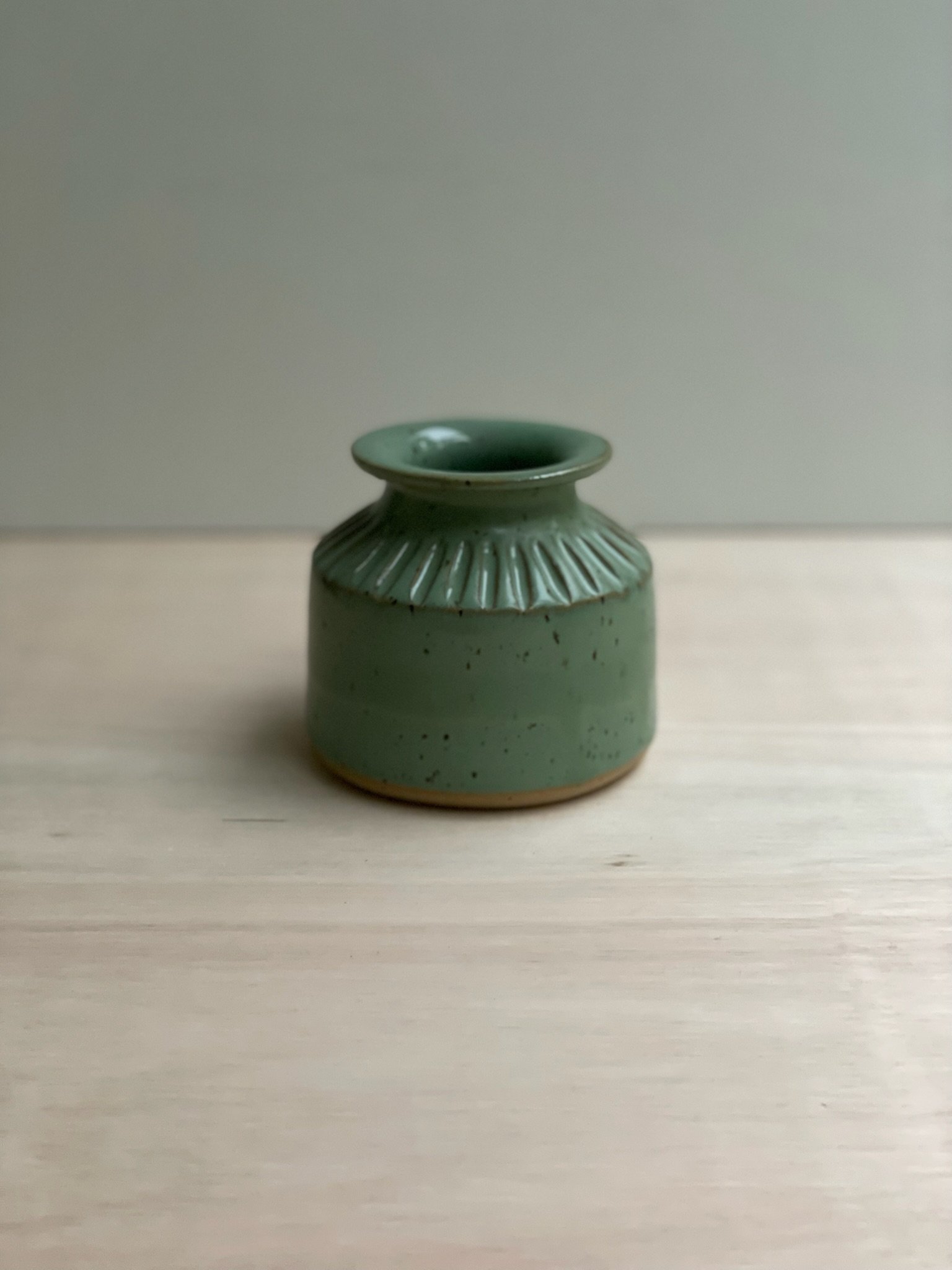 Small carved inkwell vase