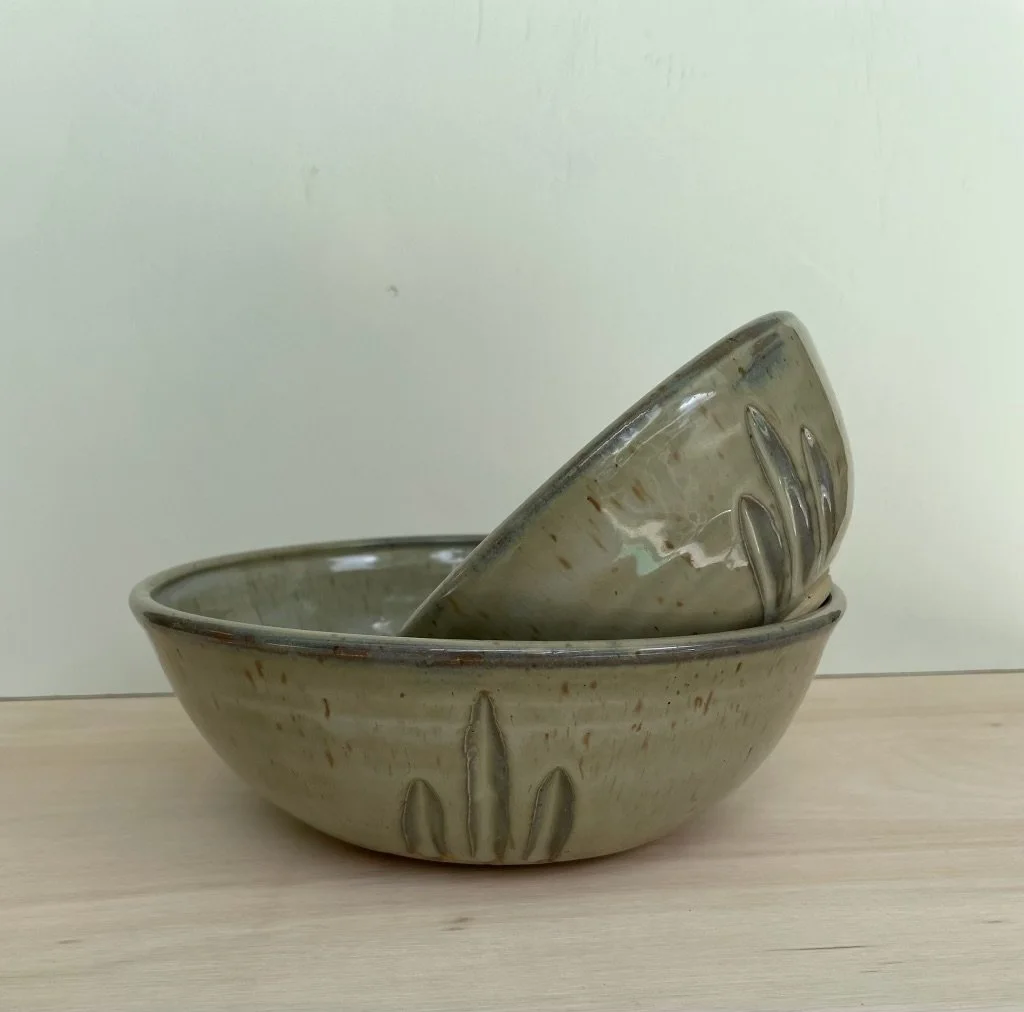 Carved gray stoneware bowls