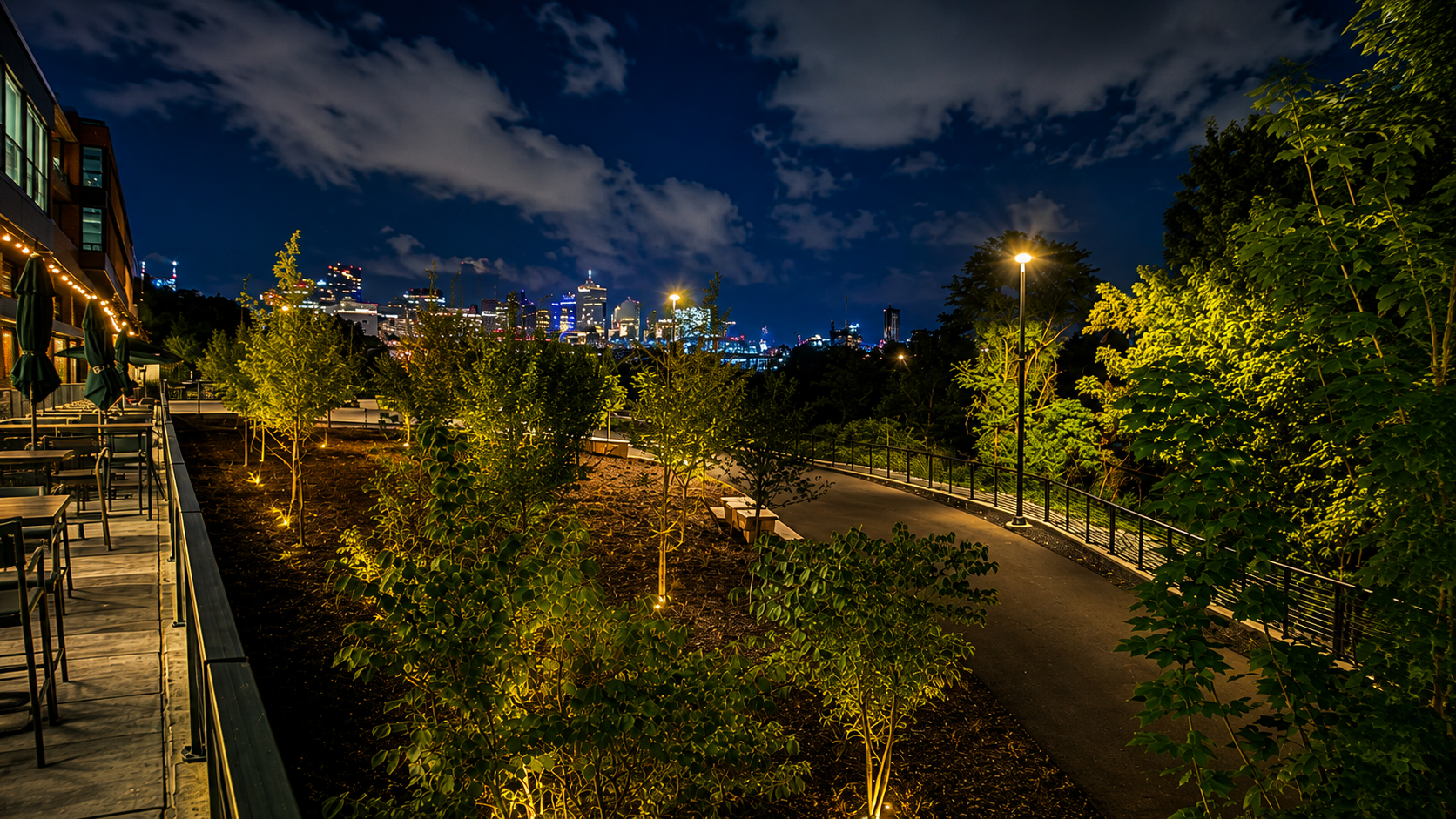 Riverfront patio at Hoppin' River North overlooking the Nashville skyline and Greenway walking trail.