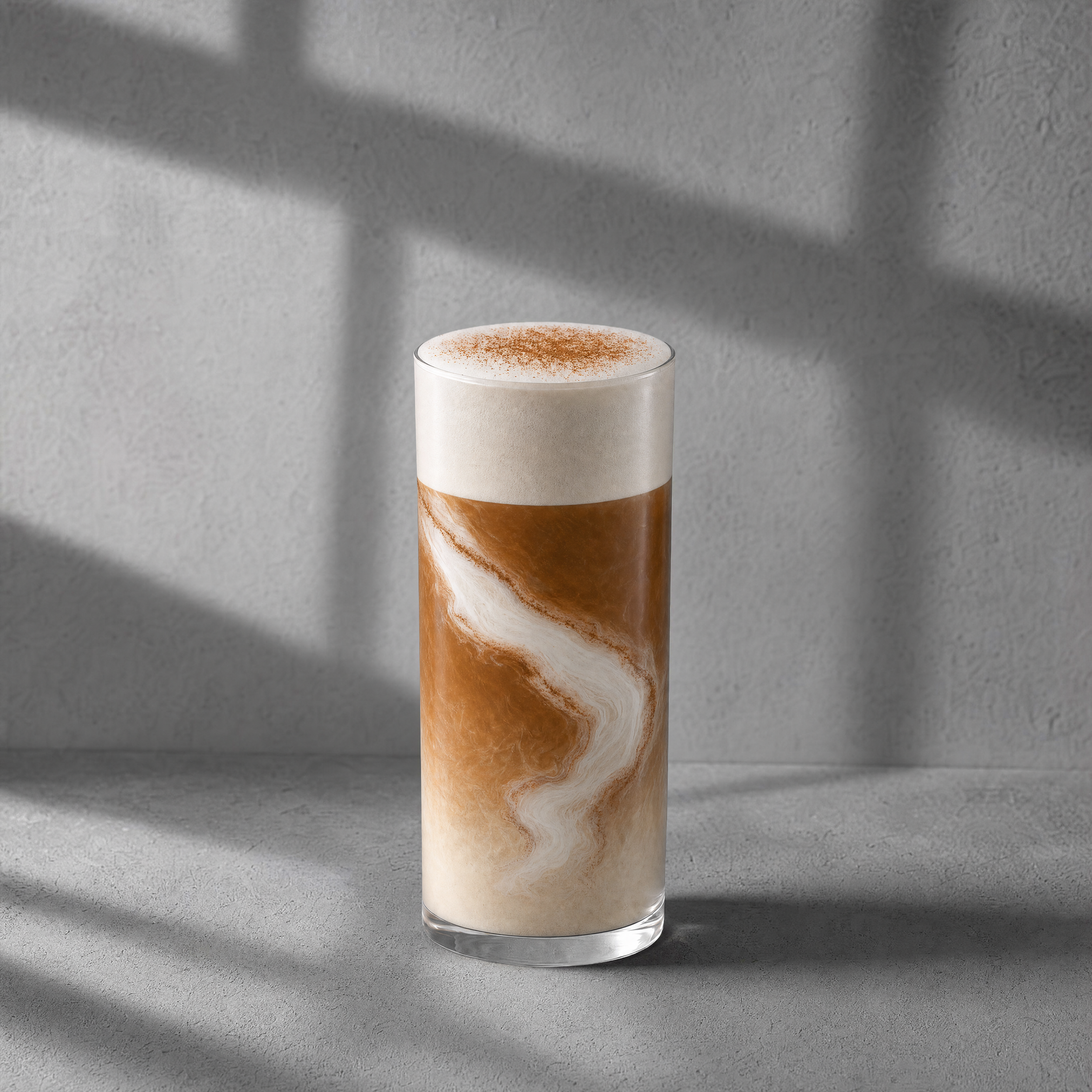 Iced Brewboat apple pie chai topped with creamy cold foam and cinnamon
