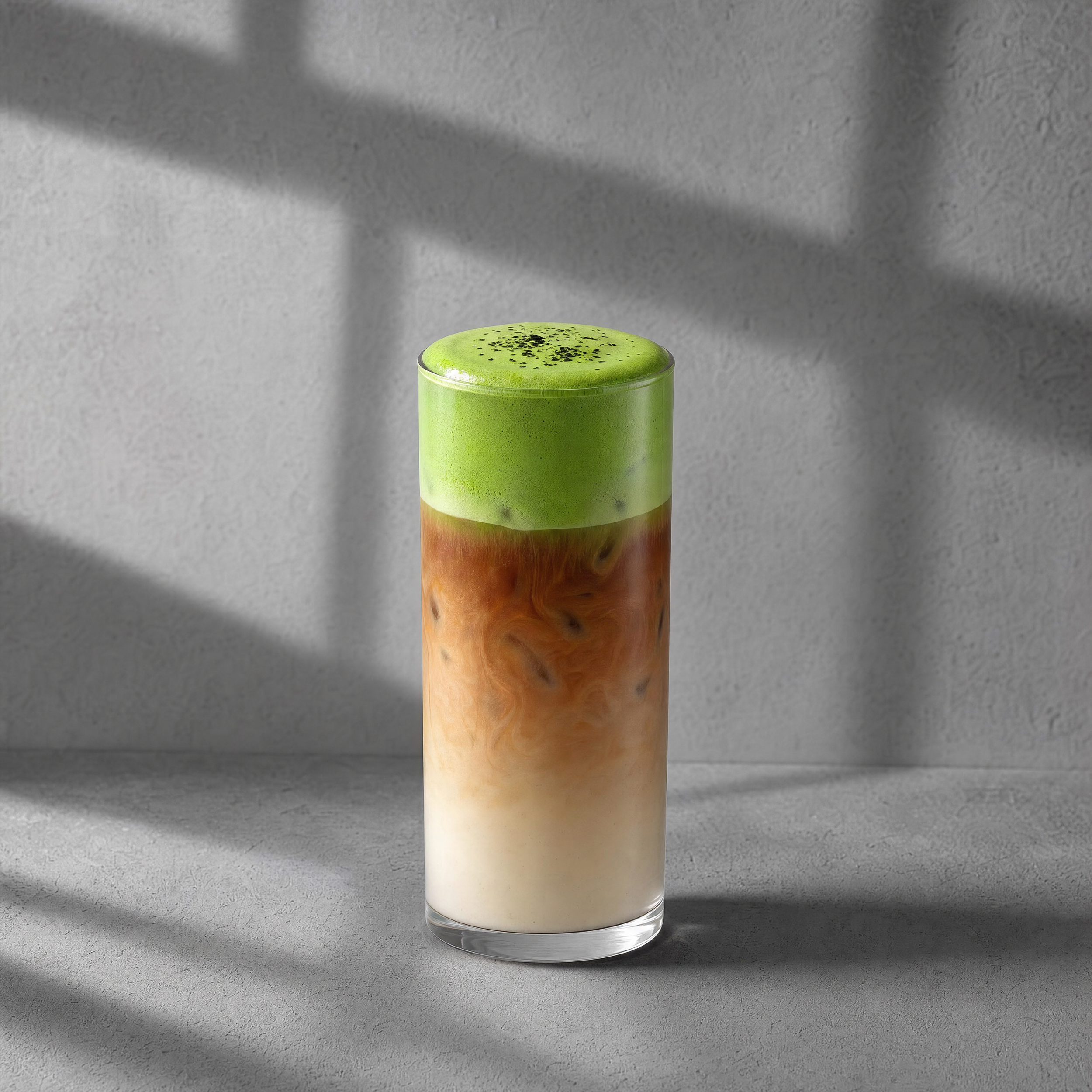 Iced Brewboat matcha chai topped with matcha cold foam.