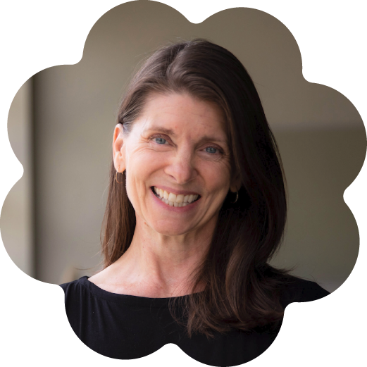 Jill Sonke, the US Cultural Policy Fellow at Stanford University and Director of Research Initiatives at the UF Center for Arts in Medicine, wearing a black top, standing indoors with neutral background.