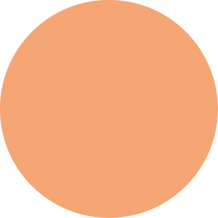 A close-up view of a makeup sponge with a peachy color.