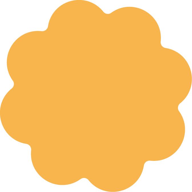 A large, orange, fluffy cookie with a scalloped edge