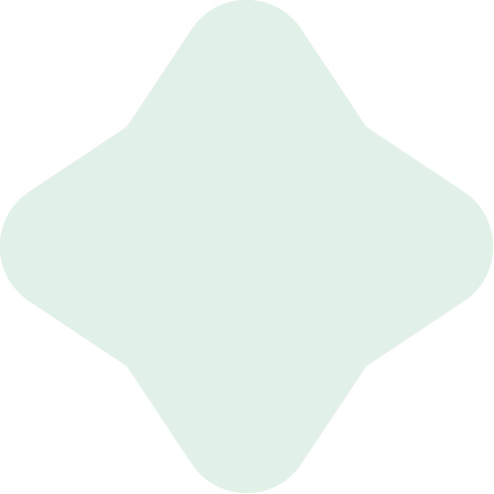 A solid light-colored, 4-pointed star-shaped object with rounded edges.