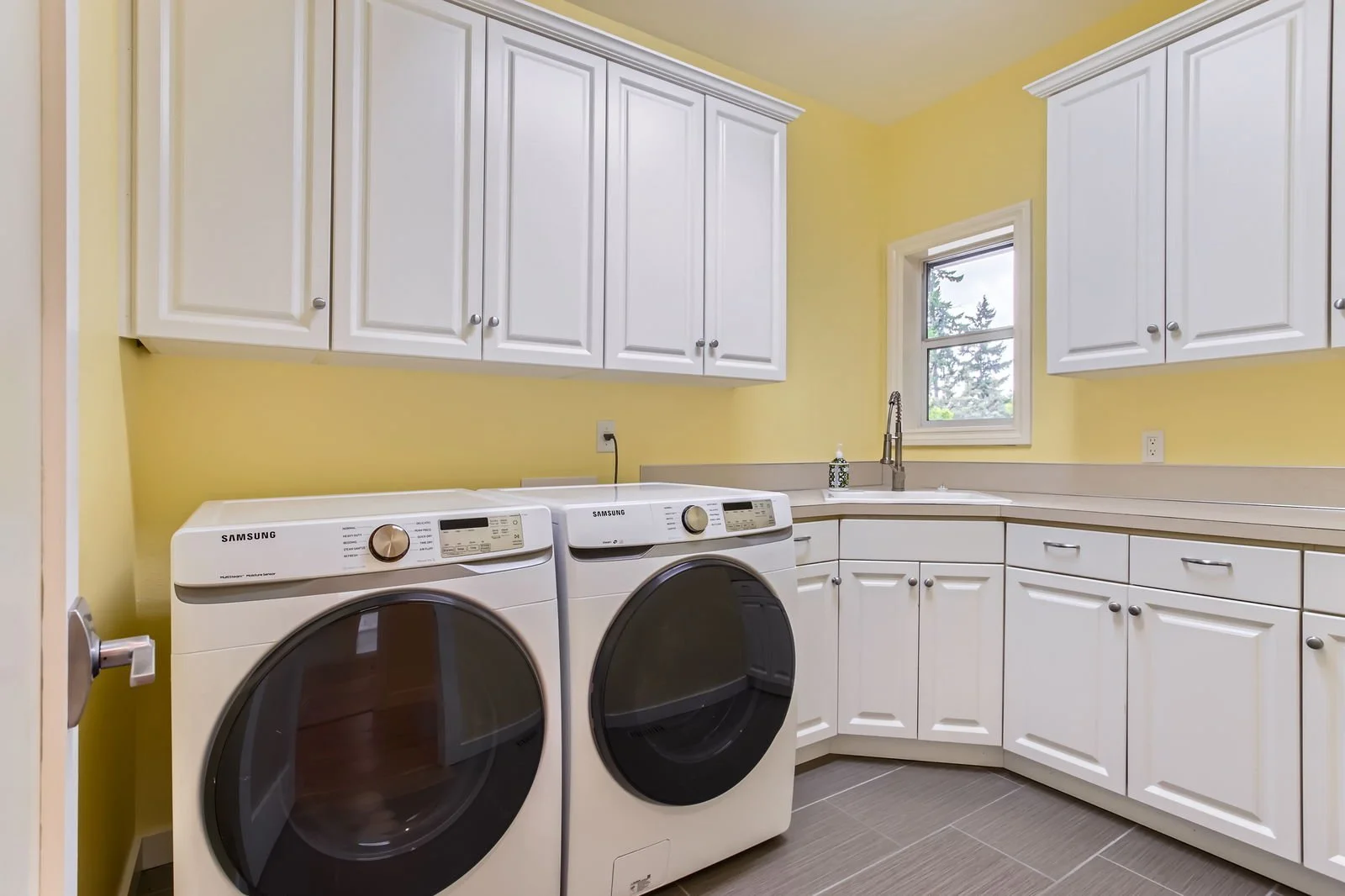 Laundry room at 15575 SW Brighton Ct in Beaverton, Oregon