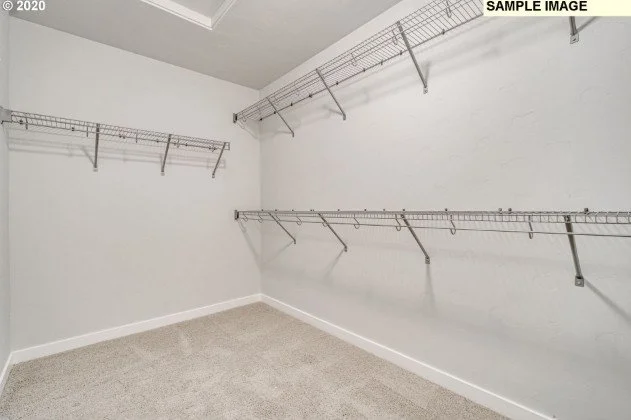 Primary bedroom walk in closet at 6209 SE Polyantha St in Hillsboro, Oregon