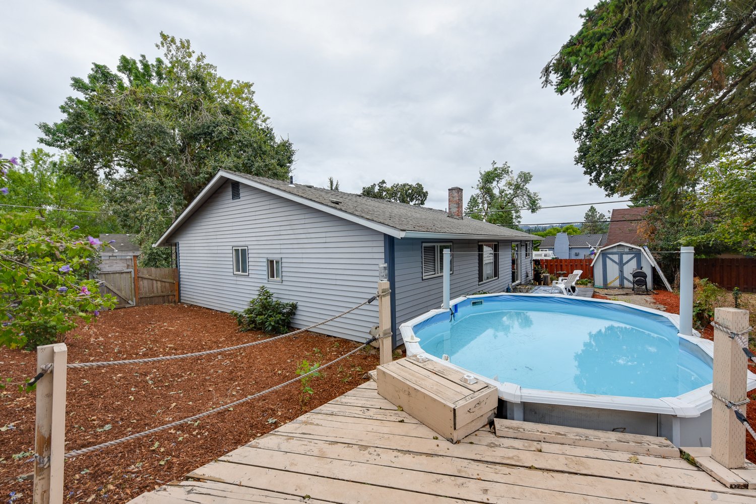 Backyard above ground pool at 4995 SE Ina Ave in Milwaukie, Oregon
