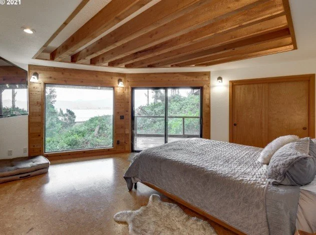 Primary bedroom at 27 Dune Point Ln in Gleneden Beach, Oregon