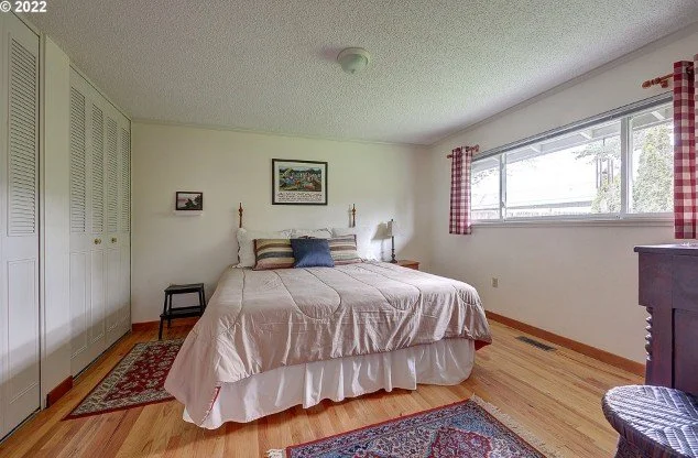 Primary bedroom at 15640 SW Royalty Pkwy in King City, Oregon