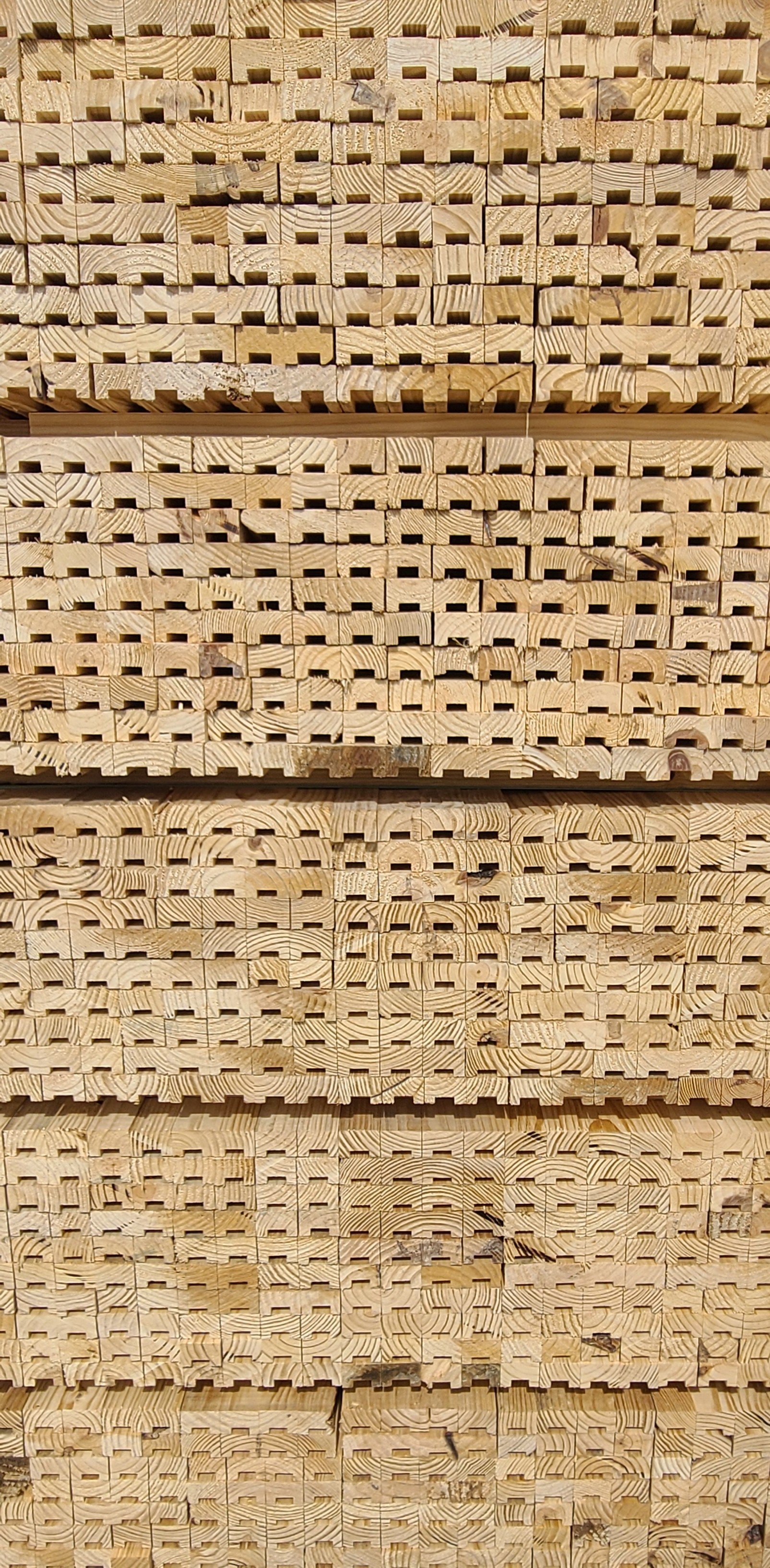 Stacks of wooden blocks with various cut patterns