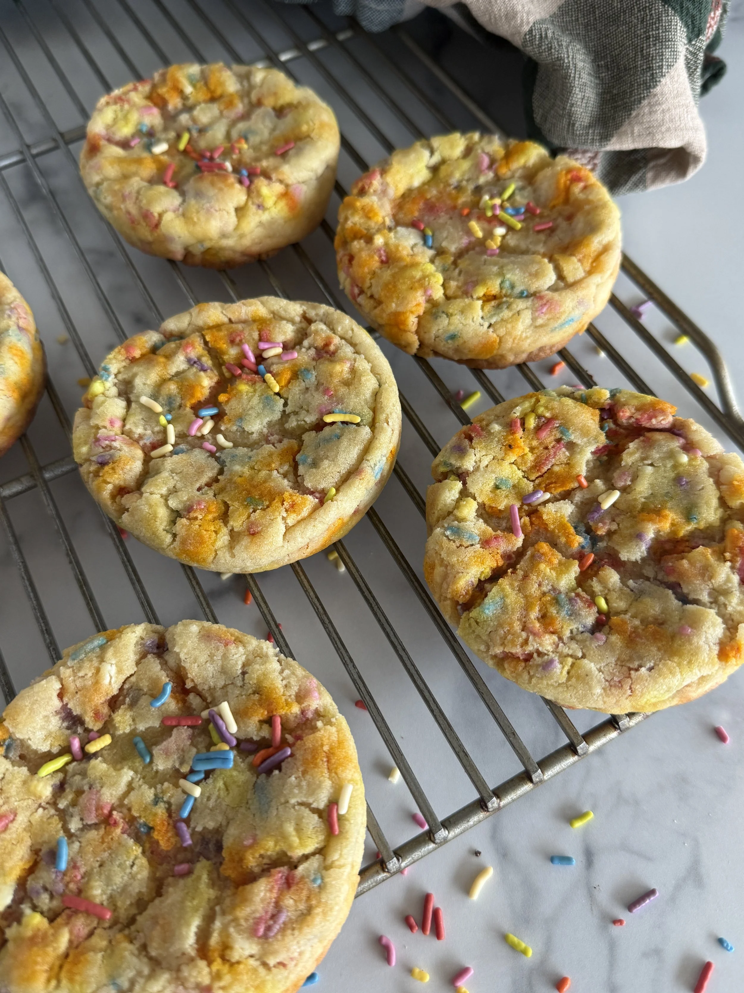Sprinkle cookies on a cooling rack.