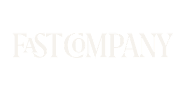 Fast Company logo in white text on a transparent background.
