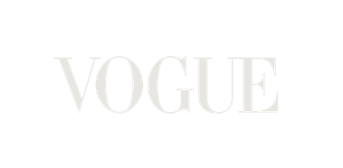 Vogue magazine logo on black background