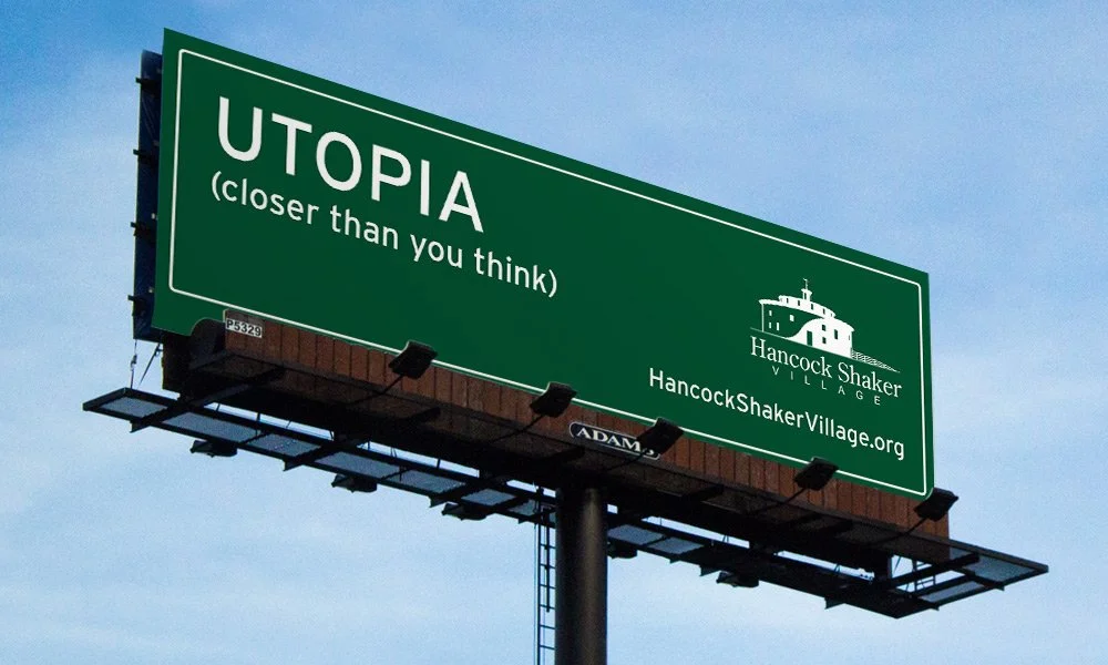 A forest green background with all white type. The Hancock Shaker Village is a white silhouette of a round stone barn and the line says "Utopia (closer than you think)"