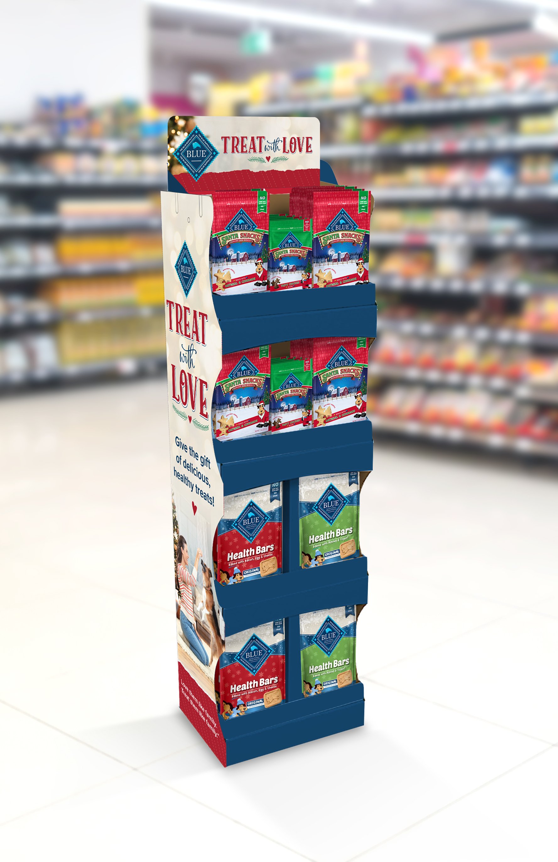 A retail shipper featuring holiday imagery and Blue Buffalo holiday treats like Santa Snacks. The headline says "Treat with Love"