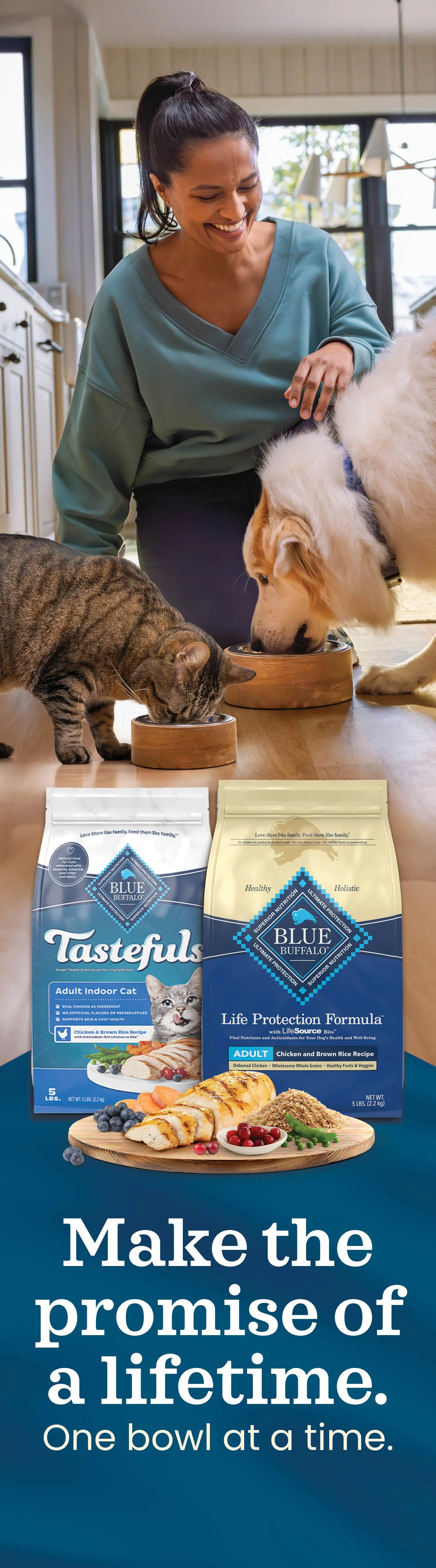 A smiling woman kneels down to feed her fluffy white dog and beautiful brindle cat. We see a bag of BLUE Tastefuls and BLUE Life Protection Formula at the bottom with the line "Make the promise of a lifetime"