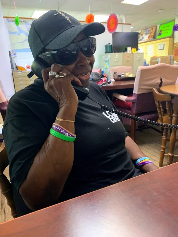 A woman answering the phone