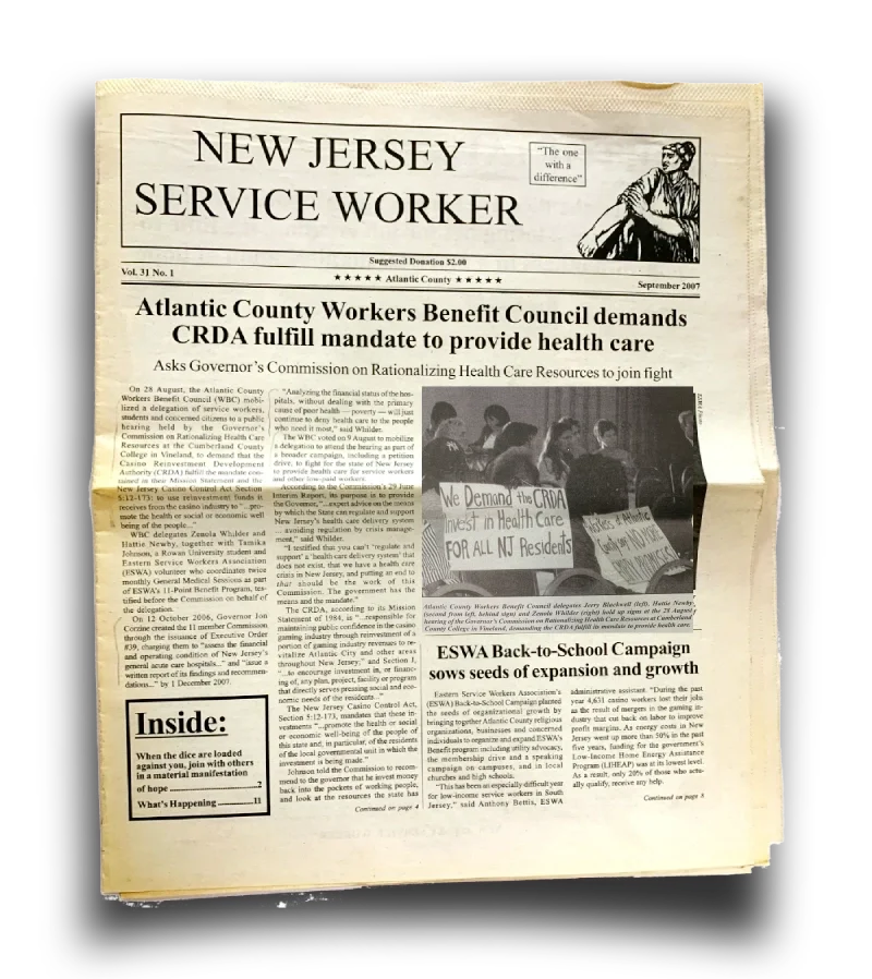 A newspaper with a photo of people holding up signs and a headline that reads "Atlantic County Workers Benefit Council demands CRDA fulfill mandate to provide health care"