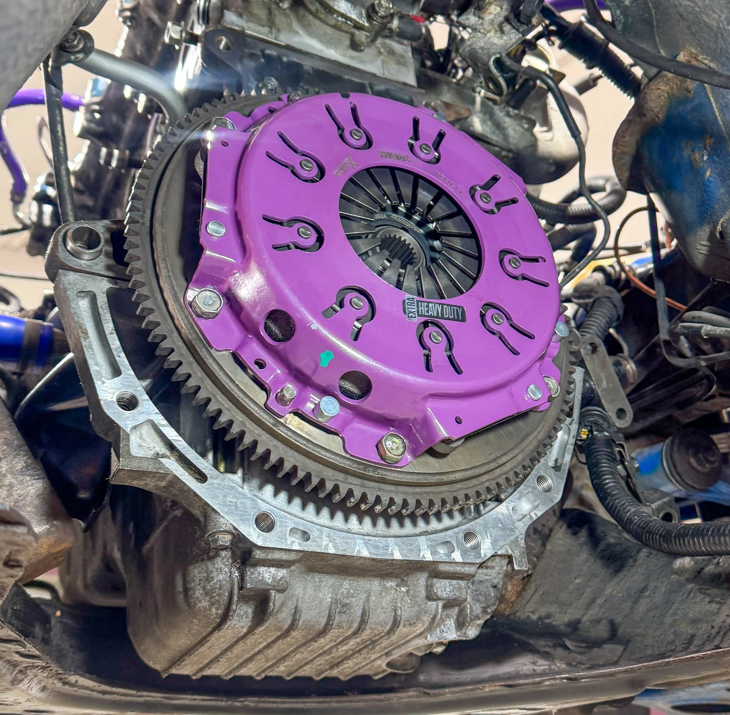 Mazda MX-5 heavy-duty race clutch installed with the gearbox removed