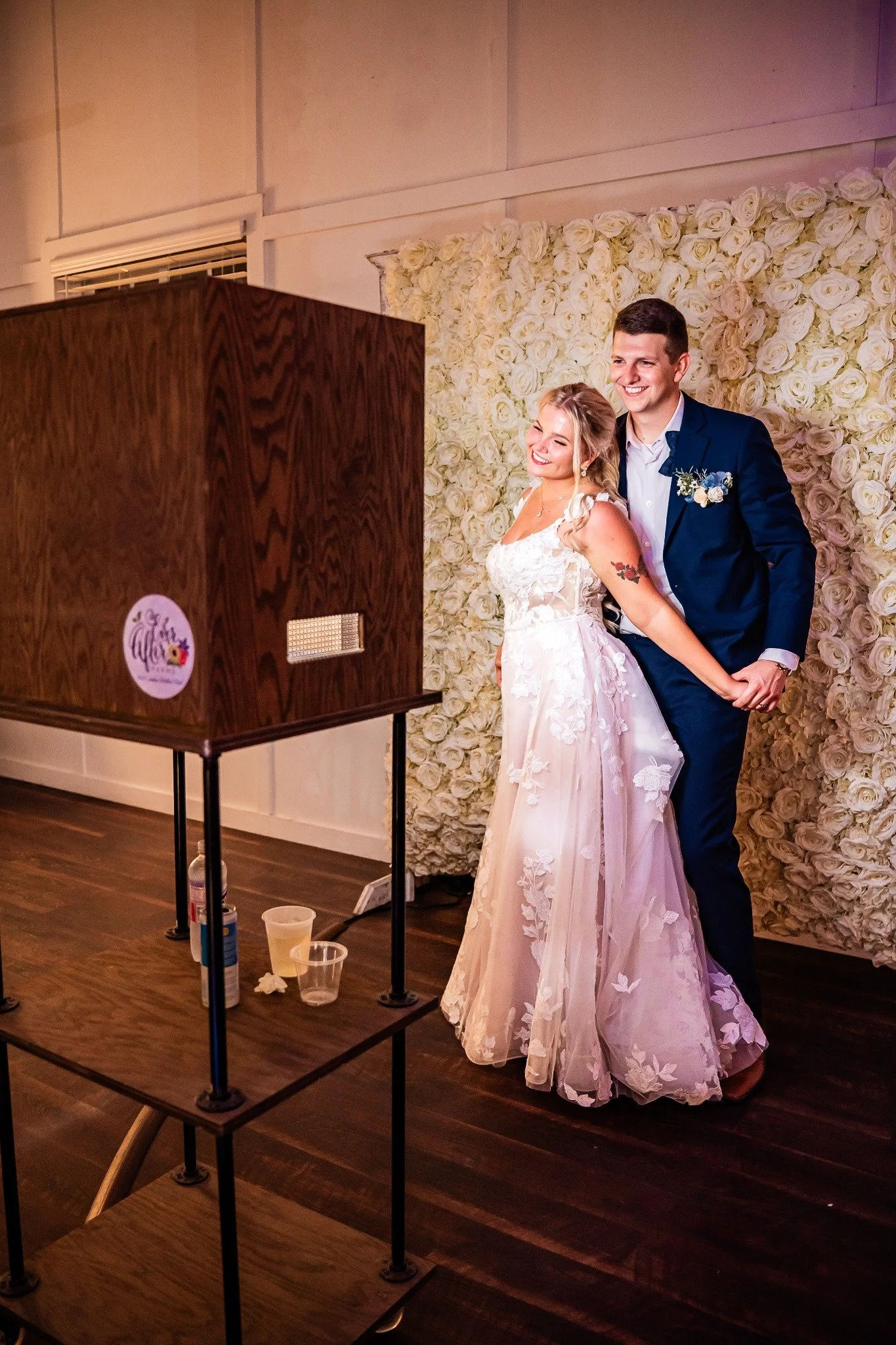 bride-and-groom-photo-booth-ever-after-farms-flower-barn-vowscout.jpg