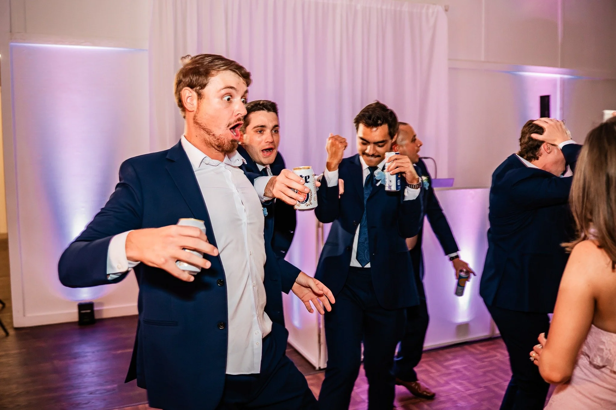 groomsmen-dancing-reception-ever-after-farms-flower-barn-vowscout.jpg