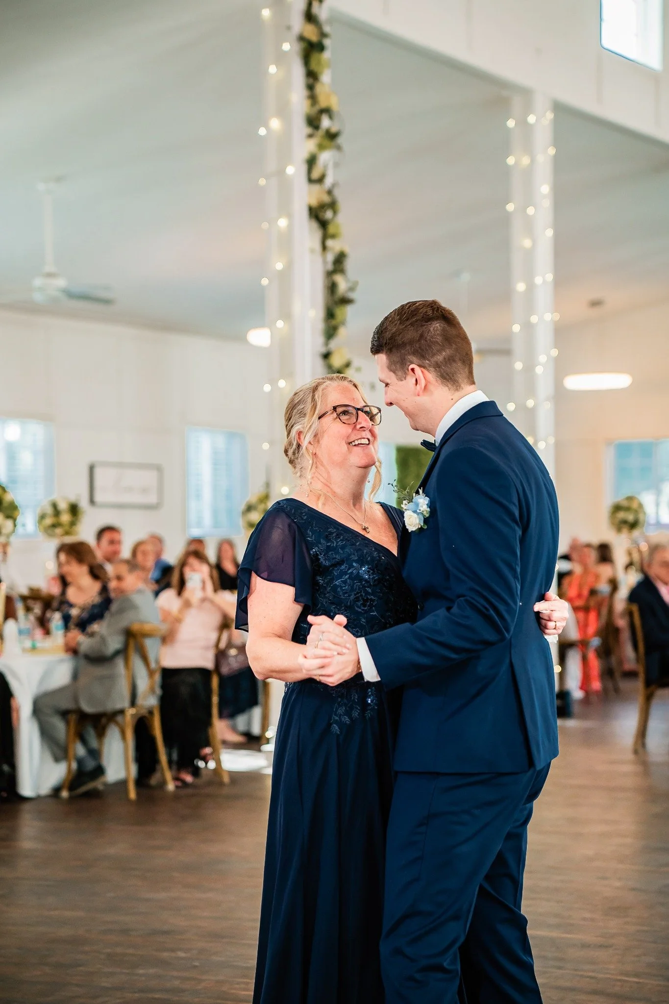 mother-son-dance-ever-after-farms-flower-barn-vowscout.jpg
