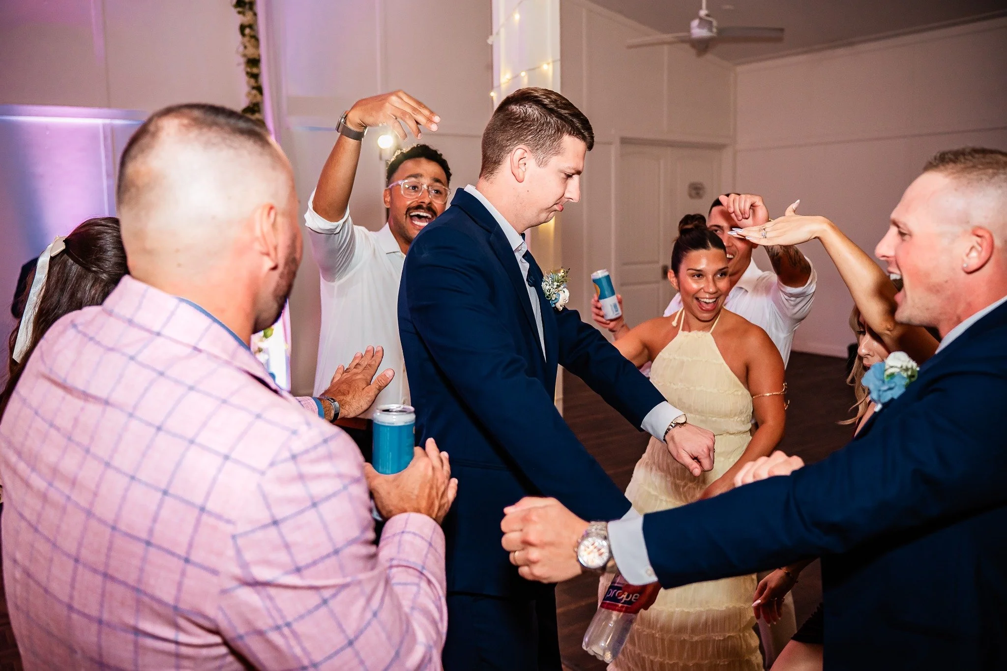 groom-dancing-with-guests-ever-after-farms-flower-barn-vowscout.jpg