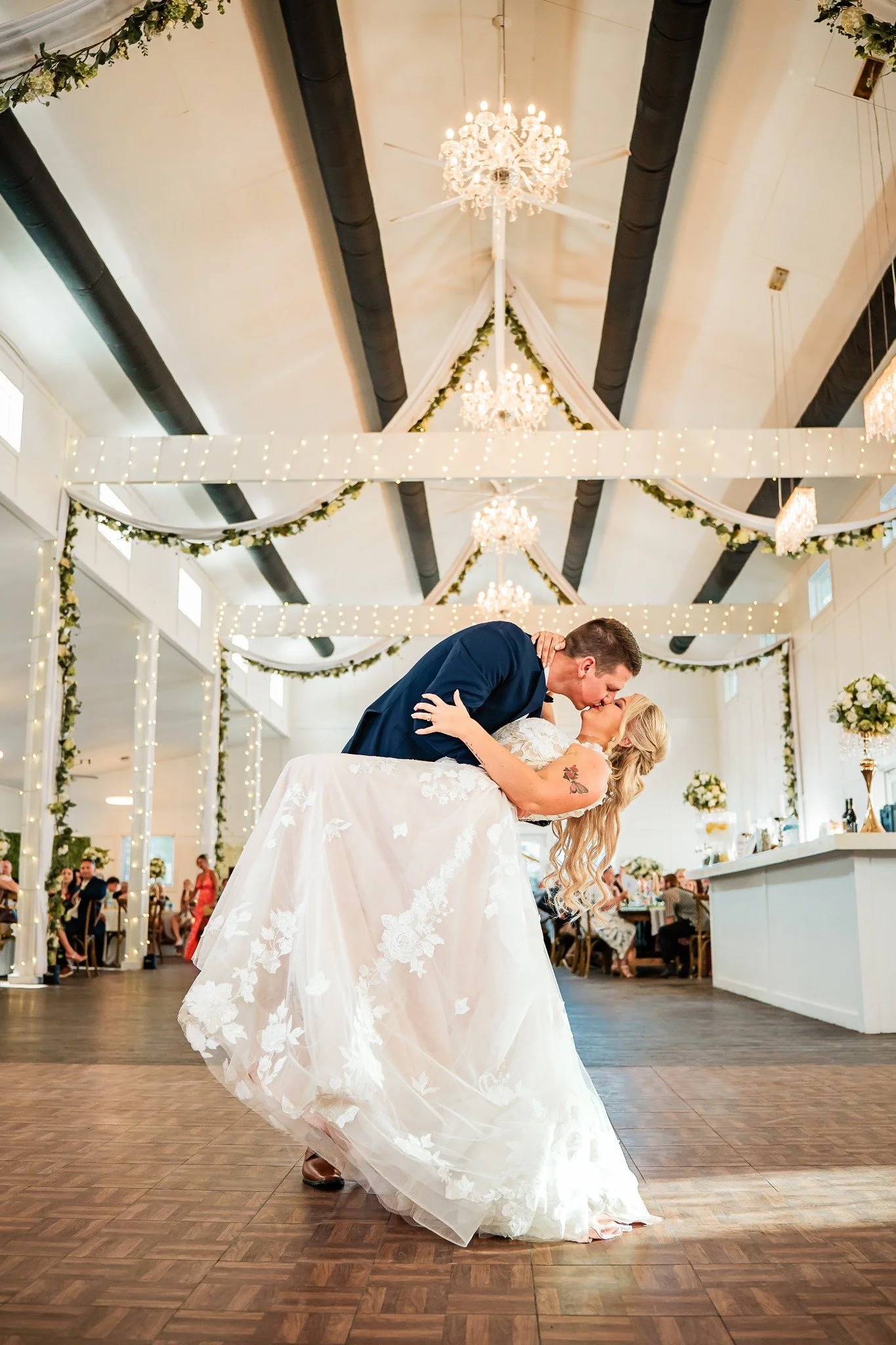 first-dance-dip-kiss-ever-after-farms-flower-barn-vowscout.jpg