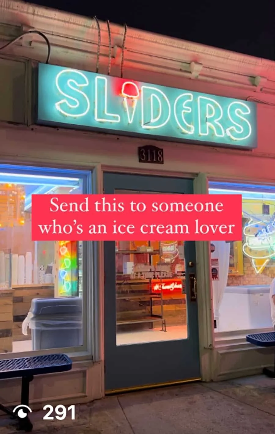 Ice cream shop with neon sign that says 'SLIDERS' and additional neon ice cream cone sign in the window.