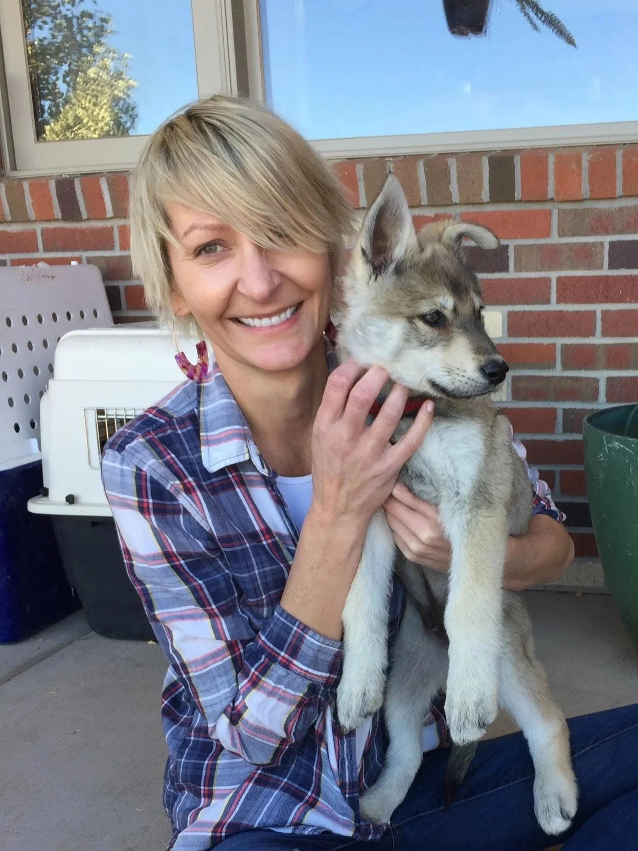 Marta Tuznik, LCSW, holding a puppy