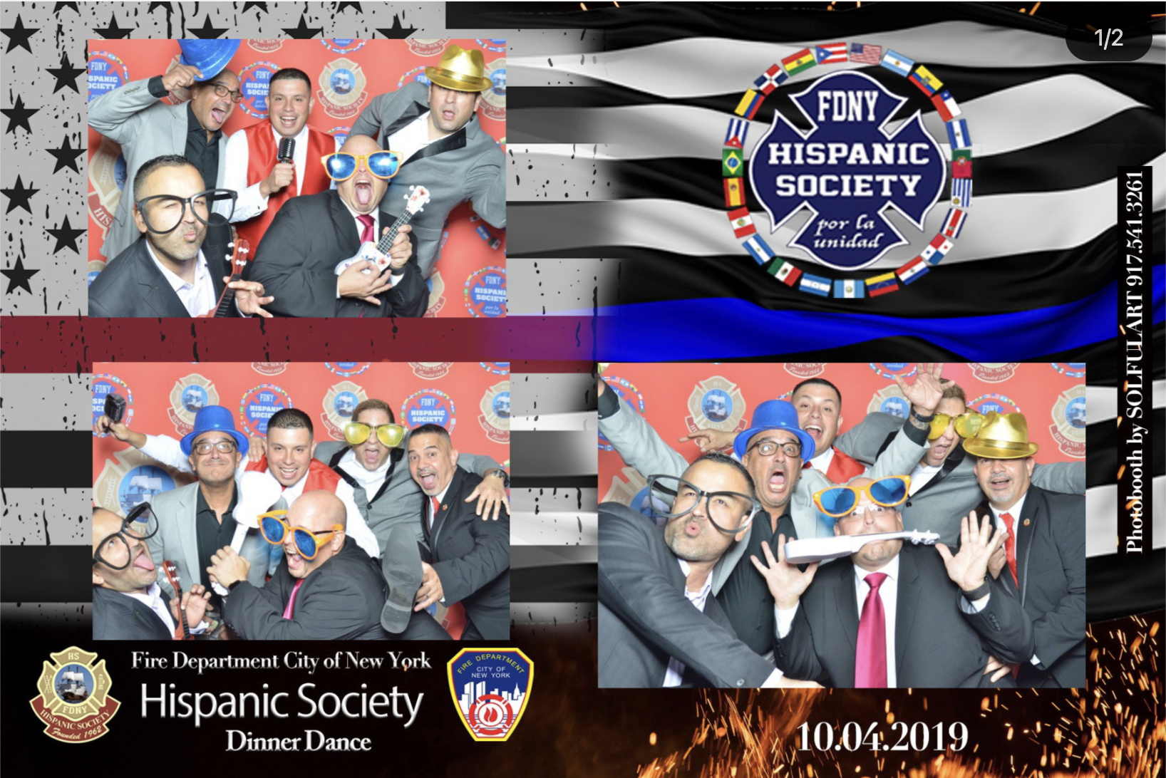 Group of men in suits and party accessories posing for a photo booth at a Hispanic Society dinner dance event, with a backdrop featuring the event logo, fire department badges, and decorative flags.