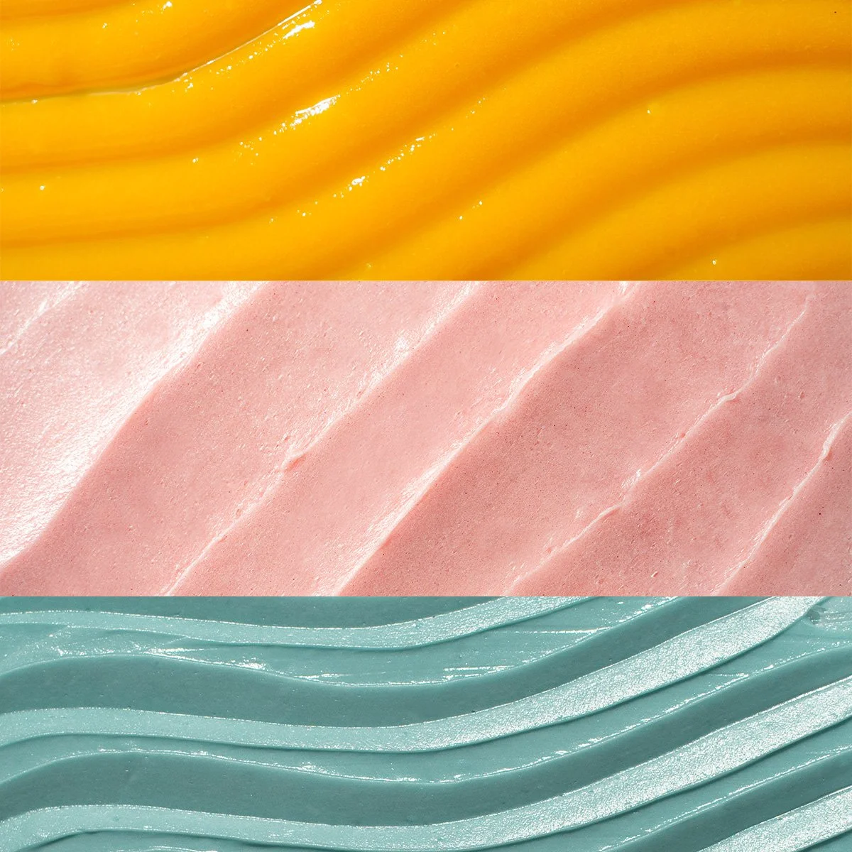 Close-up of three different types of textured foam or plastic materials in yellow, pink, and light blue colors