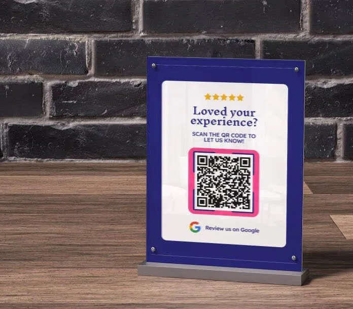 Tabletop sign with a QR code, asking for feedback on the experience, featuring five stars at the top and a Google review prompt at the bottom.