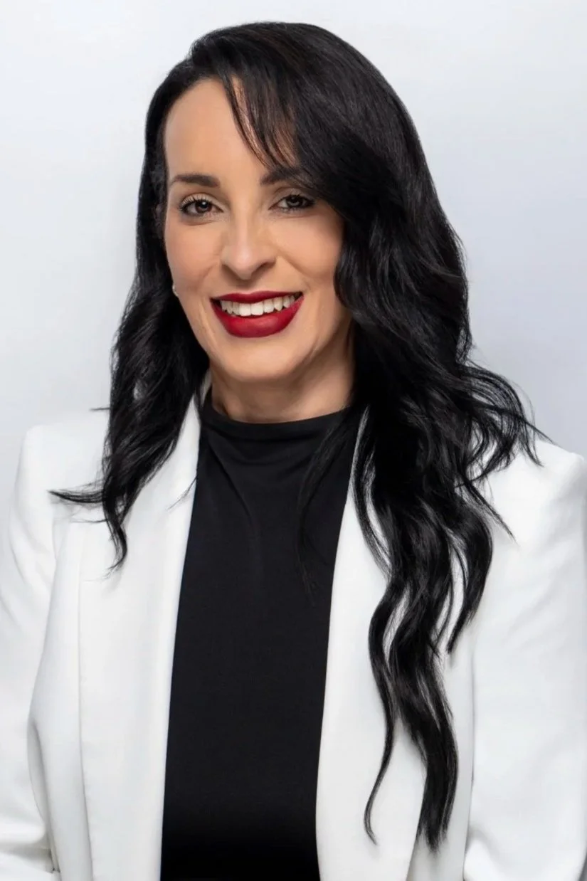 Professional headshot of Amalin Hernandez, executive security leader and investigations professional.