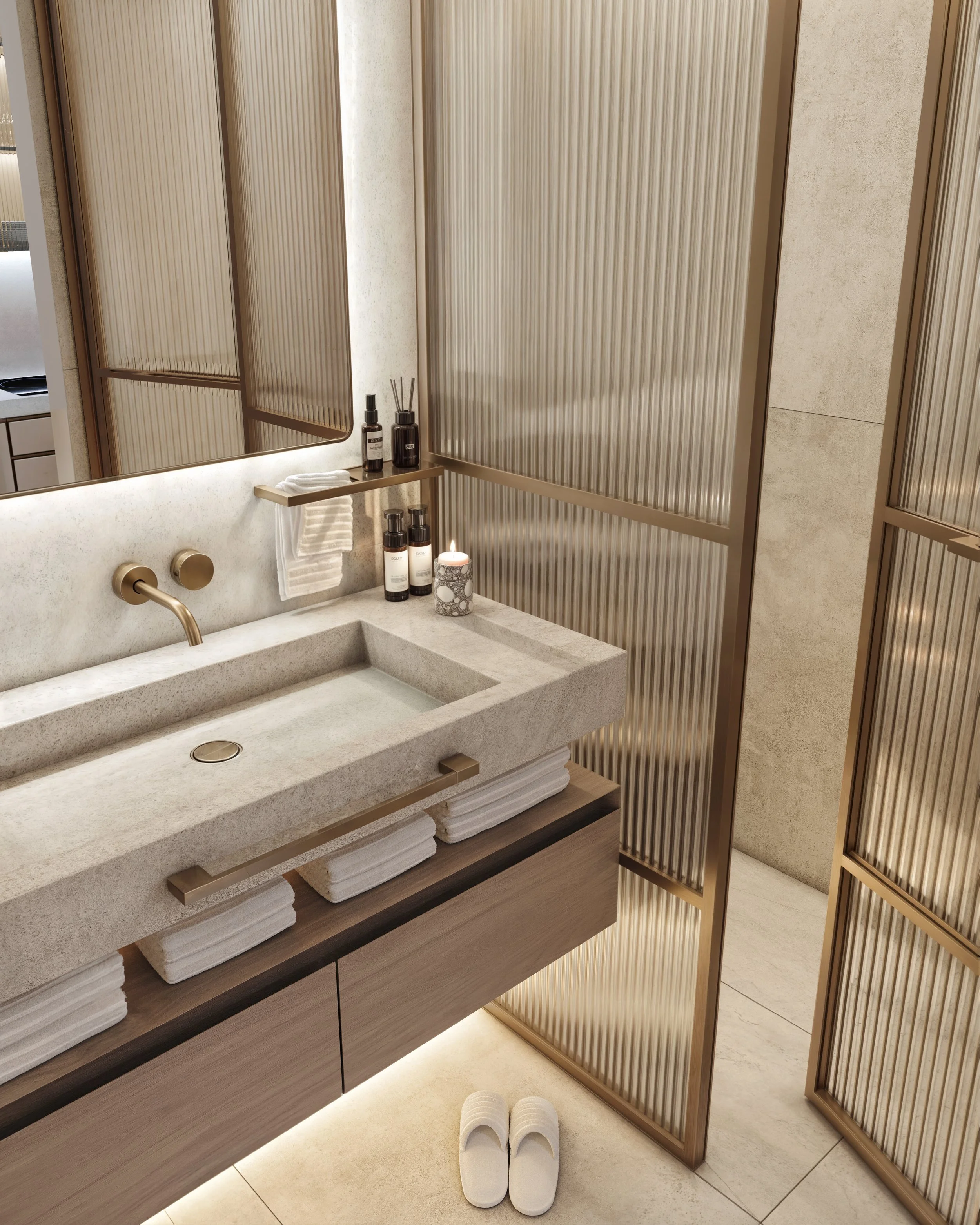 Bathroom vanity with a sink, shampoo bottles, a lit candle, a towel, and slippers on the floor, with decorative folding screens in the background.
