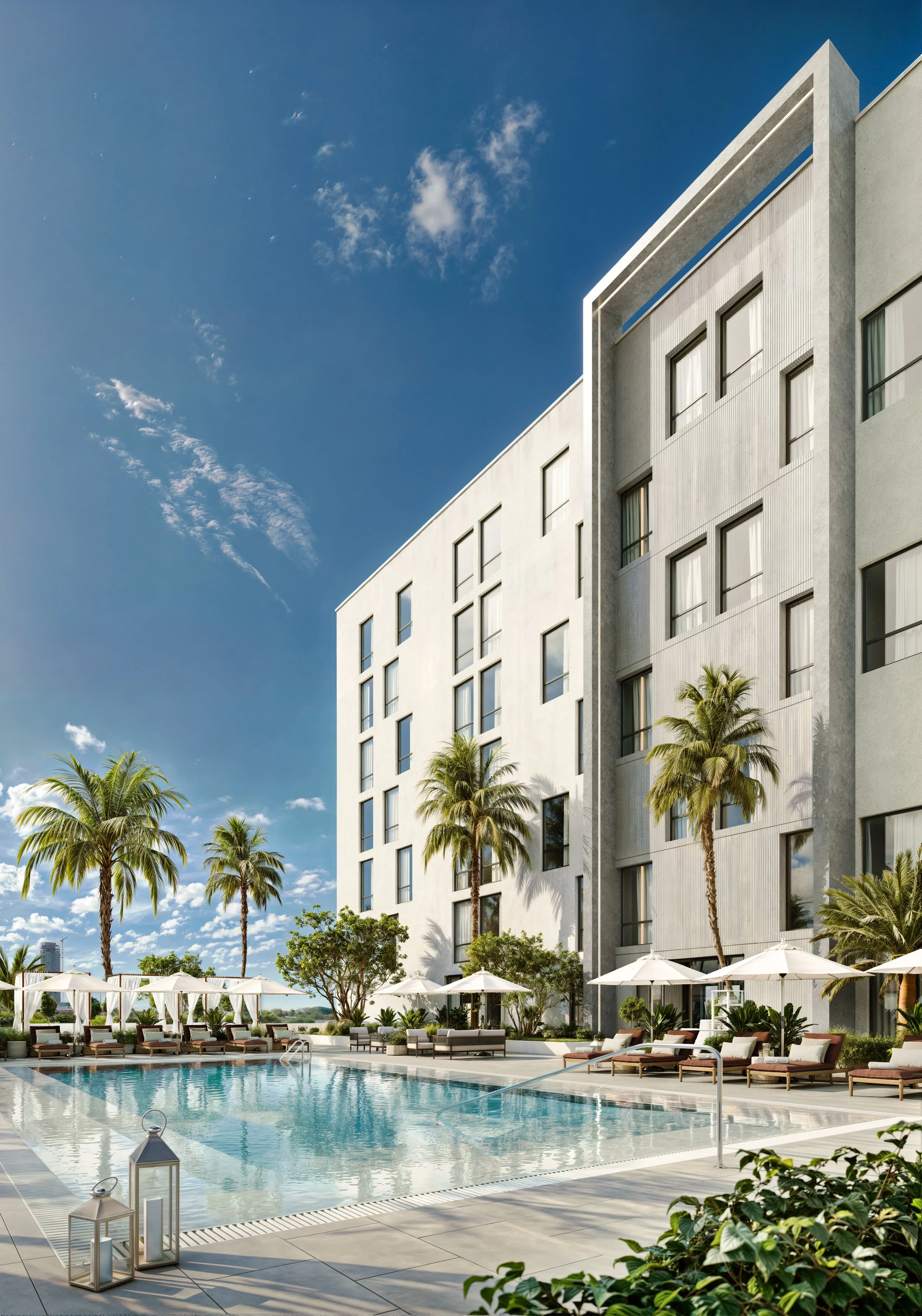 Luxury hotel pool area with lounge chairs and umbrellas, tall modern building, palm trees, blue sky with scattered clouds