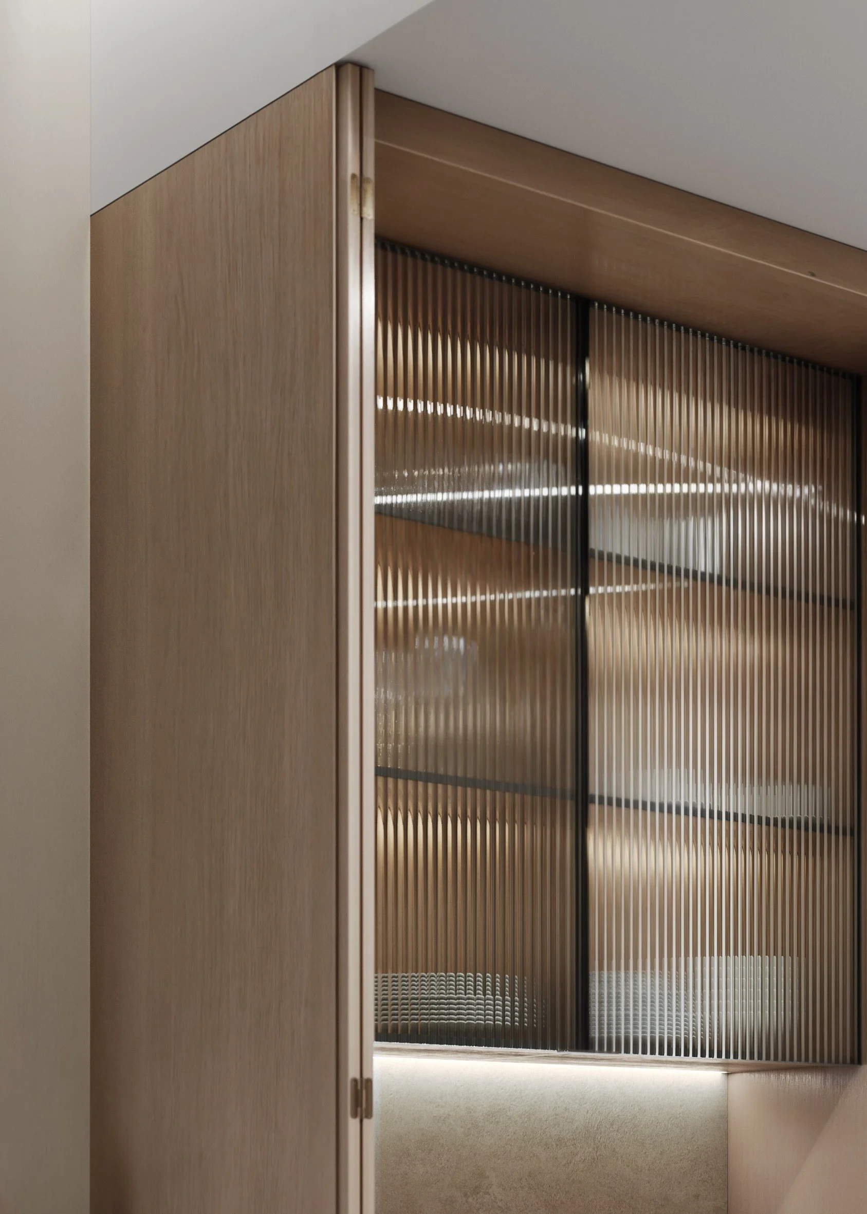 Interior of a modern closet or storage space with wooden panels and vertical slats.