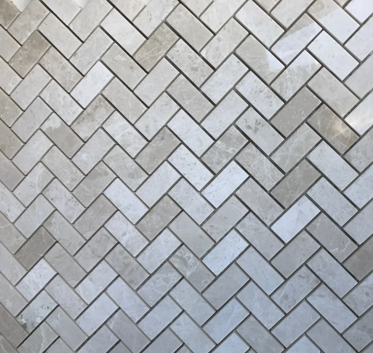 herringbone marble backsplash.jpg