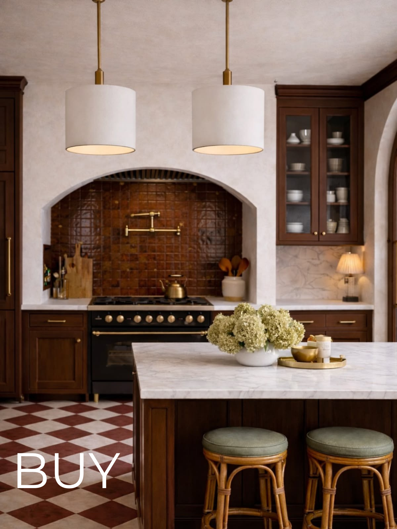 A kitchen with dark wood cabinets, a marble island, two green stools, a white flower arrangement on the island, hanging lights, a stove with brass accents, glass-front cabinets with plates, and a checkered floor.
